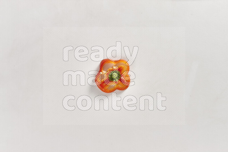 Red bell pepper slices on white background