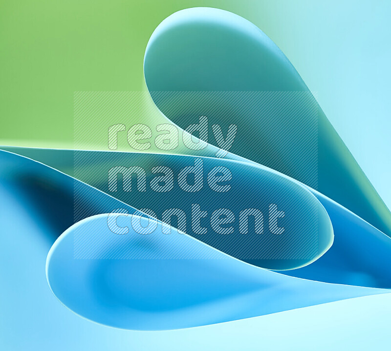 An abstract art of paper folded into smooth curves in green and blue gradients
