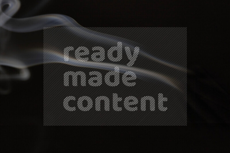 Motion of wavy smoke isolated on dark background