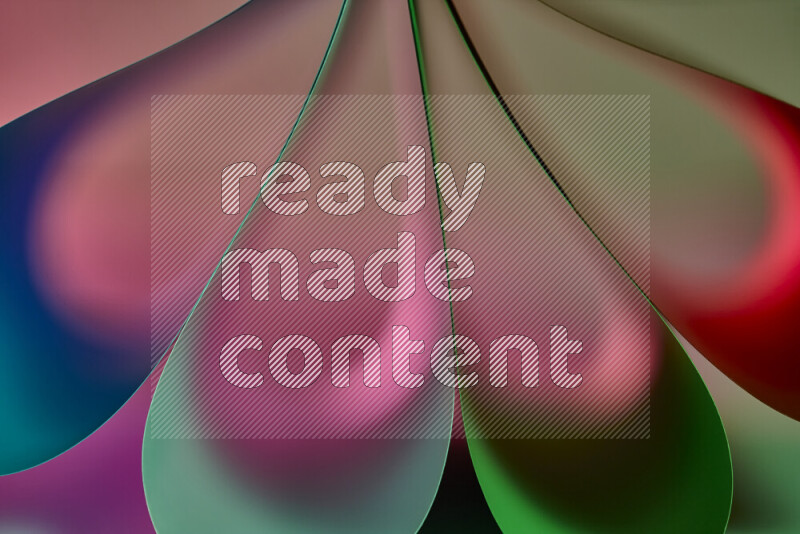 An abstract art piece displaying smooth curves in colorful gradients created by colored light