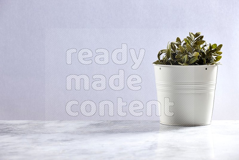 Artificial Plant in White pot on Light Grey Marble Flooring 15 degree angle