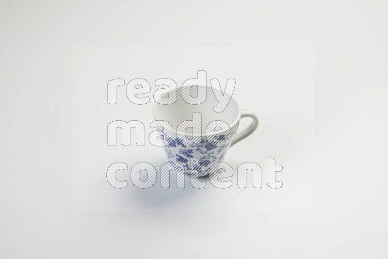 white and blue mug on white background