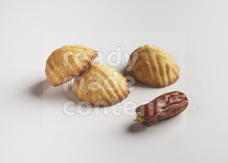Three Pieces of Maamoul direct on white background