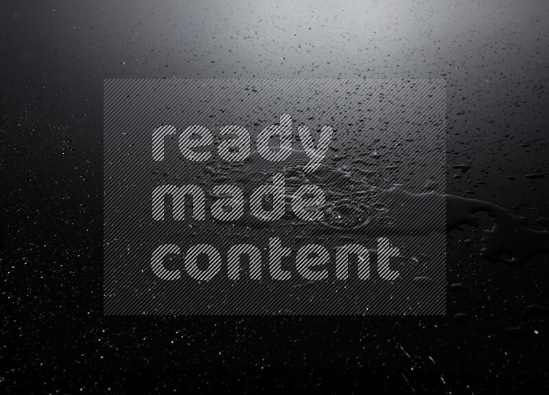 water drops, and droplets on black background