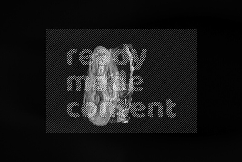 Transparent plastic textures on black background