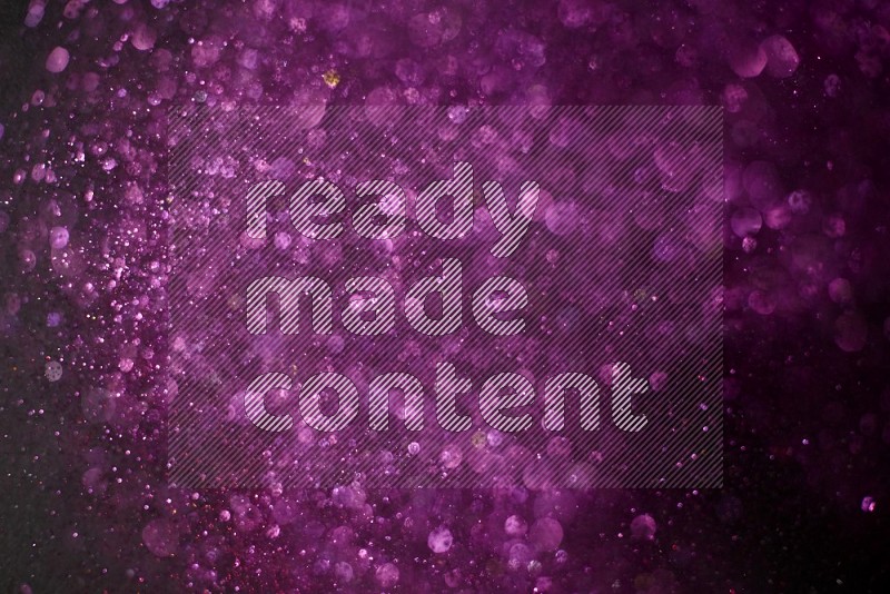 Pink glitter powder isolated on black background