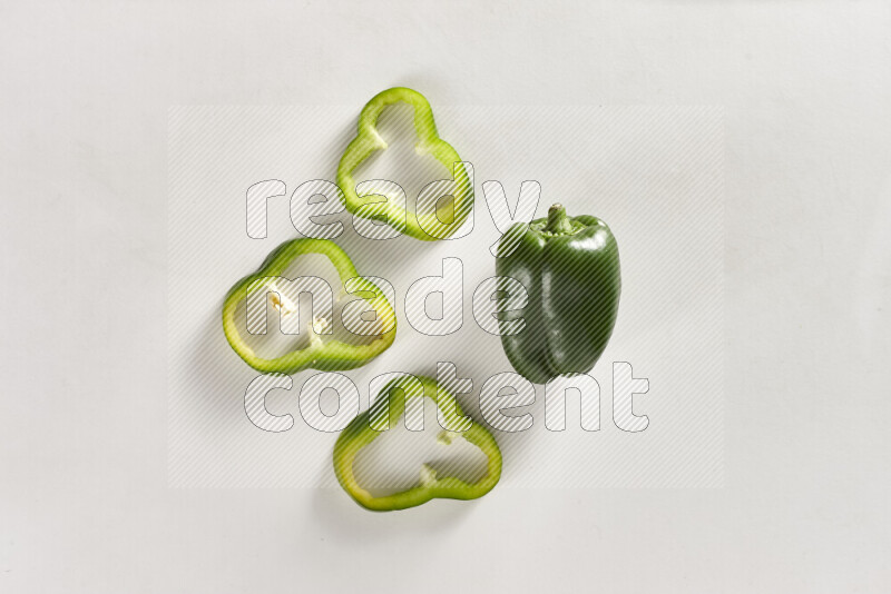 Green bell pepper on white background