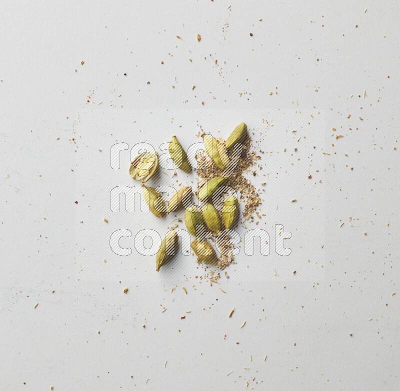 Top-view shot of Cardamon on white background