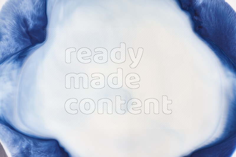 لقطة مقربة لأنماط دوامية باللون الأزرق والأبيض