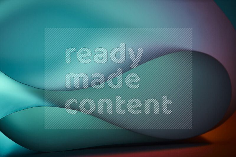 An abstract art piece displaying smooth curves in blue gradients created by colored light