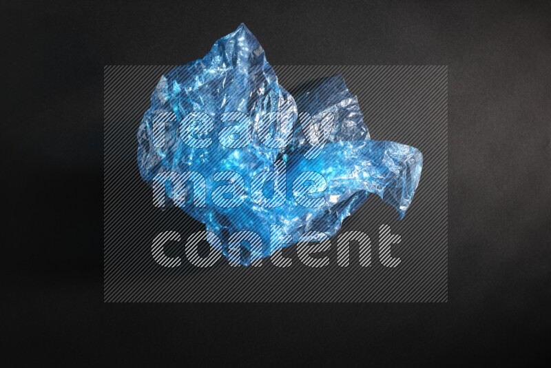 Colored plastic textures on black background