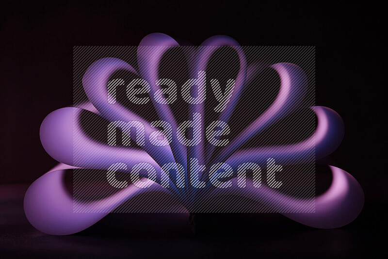An abstract art piece displaying smooth curves in purple gradients created by colored light