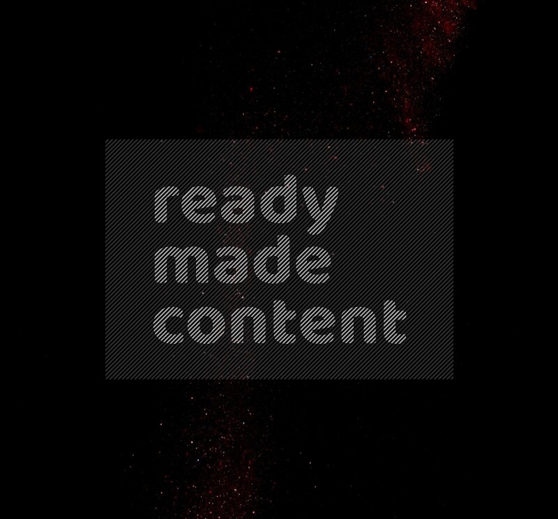 Red glitter powder isolated on black background