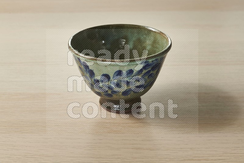 Decorative Pottery Bowl on Oak Wooden Flooring, 15 degrees