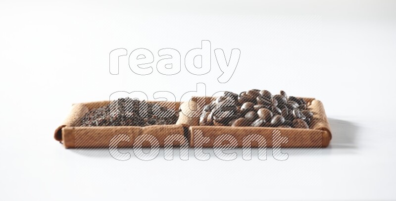 2 squares of cinnamon sticks full of coffee beans and black tea on white flooring