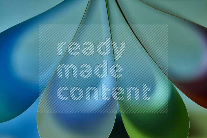 An abstract art piece displaying smooth curves in colorful gradients created by colored light