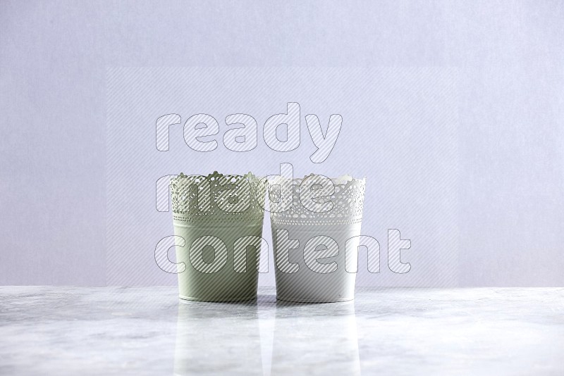 Empty Light Green & white Plant Pots on light grey Marble Flooring 15 degree angle
