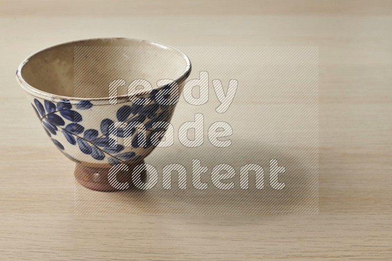 Decorative Pottery Bowl on Oak Wooden Flooring, 15 degrees
