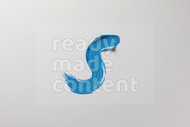 A single blue S curved brush stroke on a white background