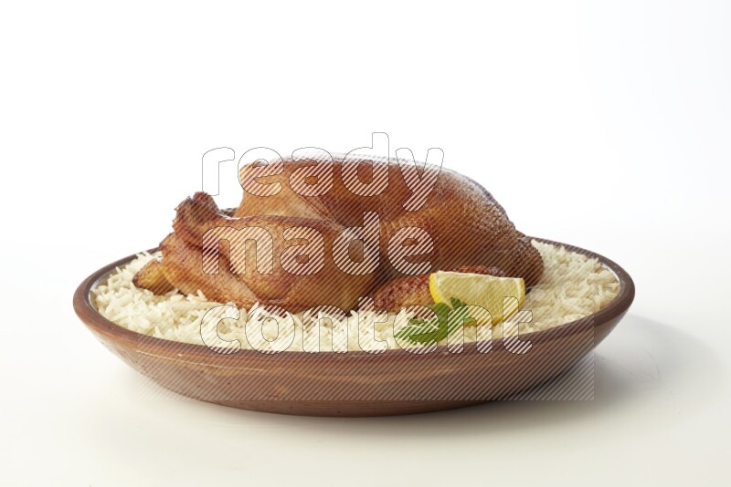 white  basmati Rice with  whole roasted chicken    on a pottery plate  direct  on white background