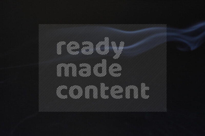 Motion of wavy smoke isolated on dark background