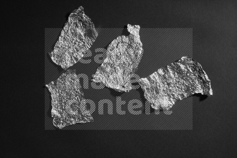 Aluminium foil on black background