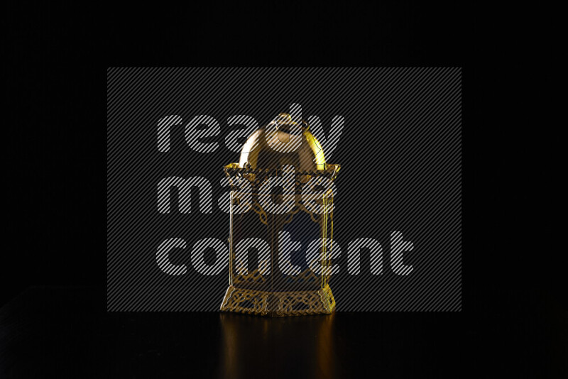 Ramadan lanterns with colored rim light against black background