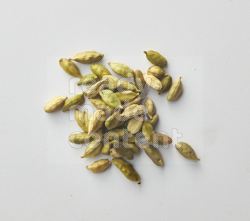 Top-view shot of Cardamon on white background