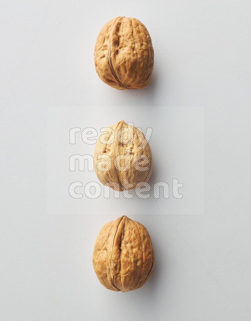 Top-view shot of walnut on white background