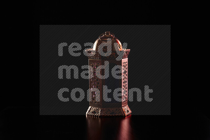 Ramadan lanterns with colored rim light against black background