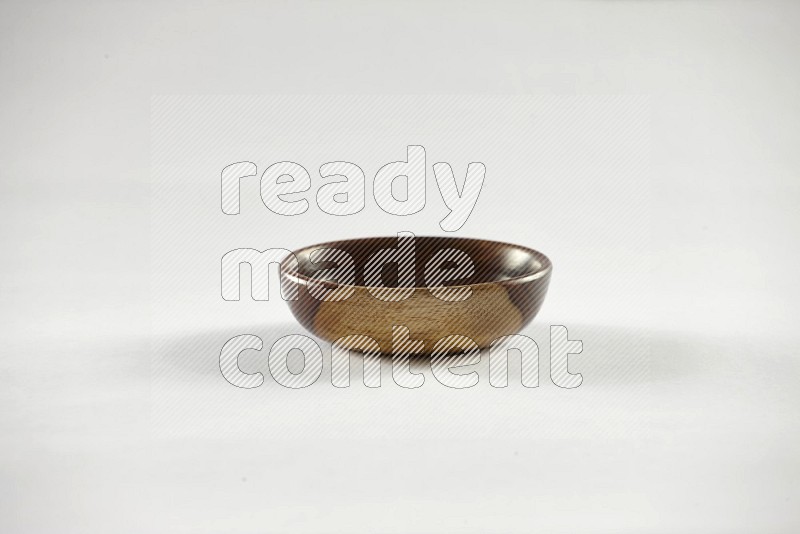 A wooden bowl on white background