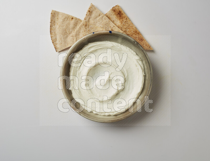 Plain Lebnah  in a grey pottery plate on a white background