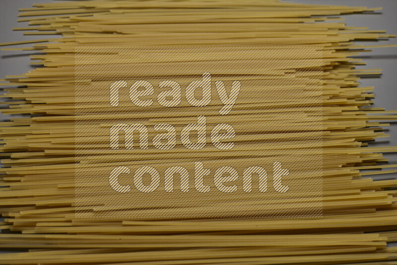 Spaghetti pasta on grey background