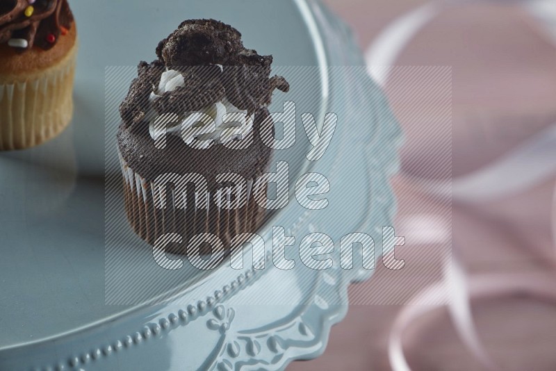 Chocolate mini cupcake topped with oreo