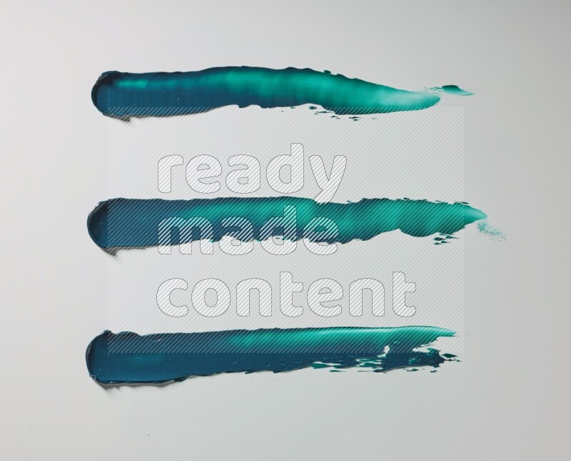 Turquoise painting knife strokes on white background