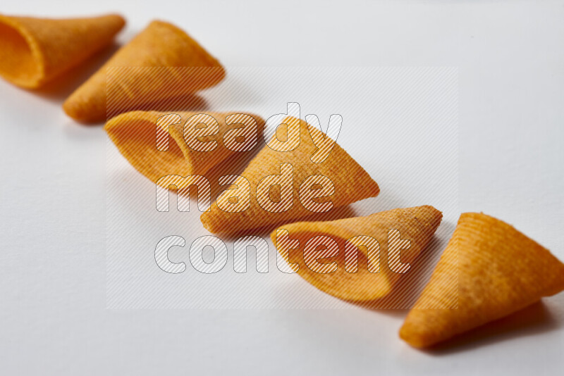 Assorted snacks on white background