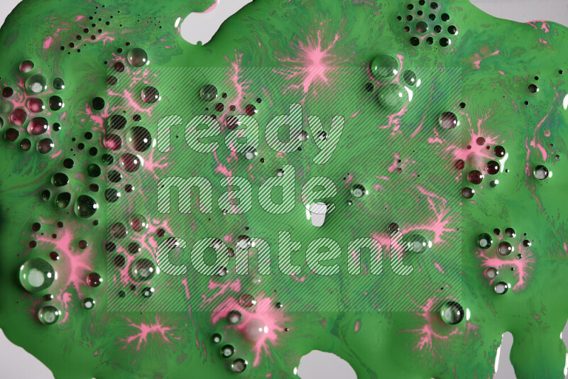 خلفية ملونة مع مزيج من ألوان الطلاء الوردي والأخضر