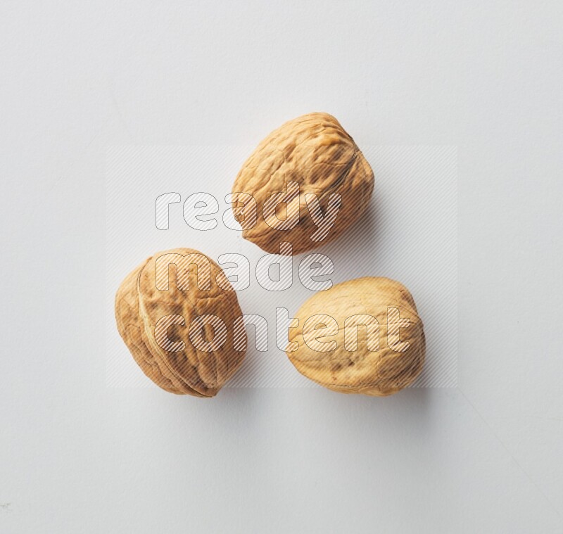 Top-view shot of walnut on white background