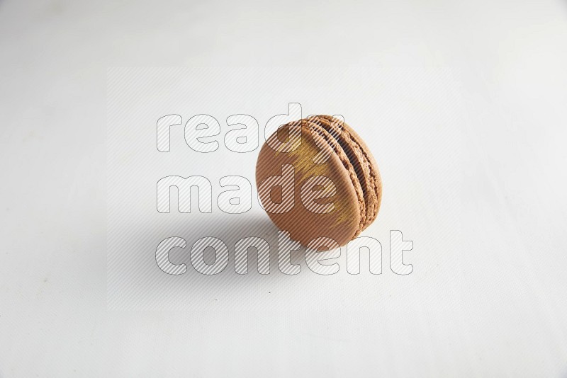 45º Shot of Brown Coffee macaron on white background