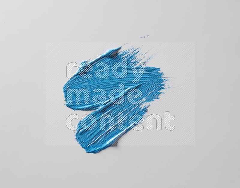 Multi blue straight brush strokes in different shapes on a white background