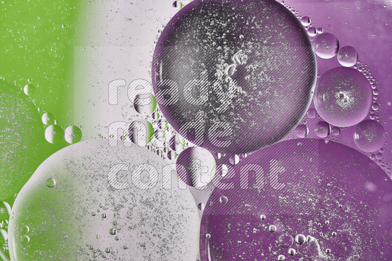 Close-ups of abstract oil bubbles on water surface in shades of purple, green and white