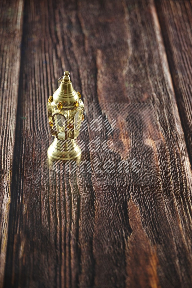 A lantern on wooden background