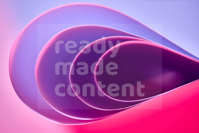 An abstract art of paper folded into smooth curves in purple and pink gradients