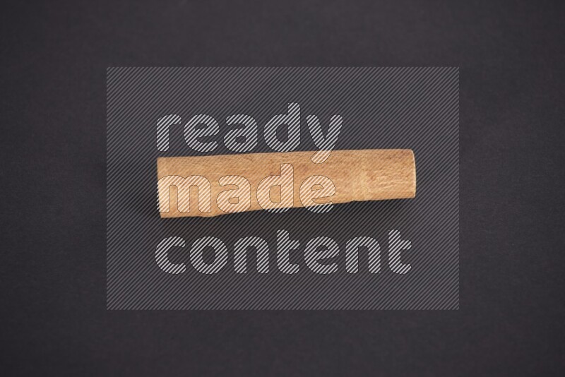 Cinnamon stick on black background