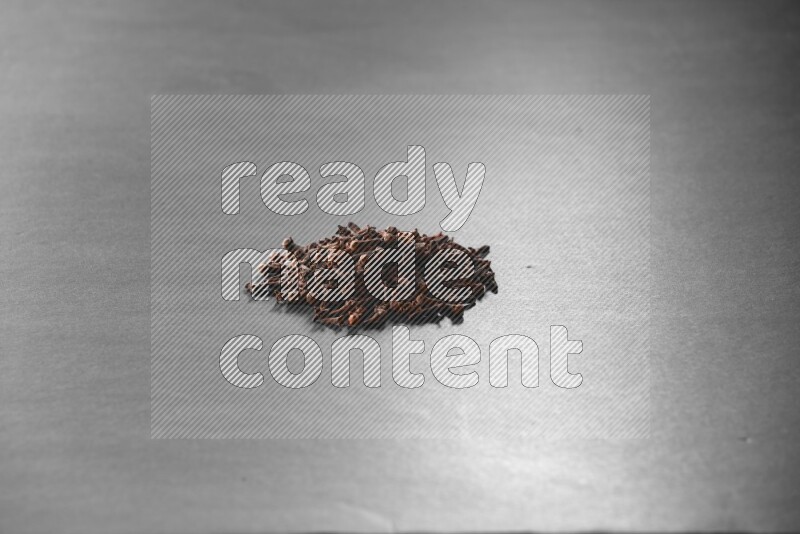 Cloves on a black flooring