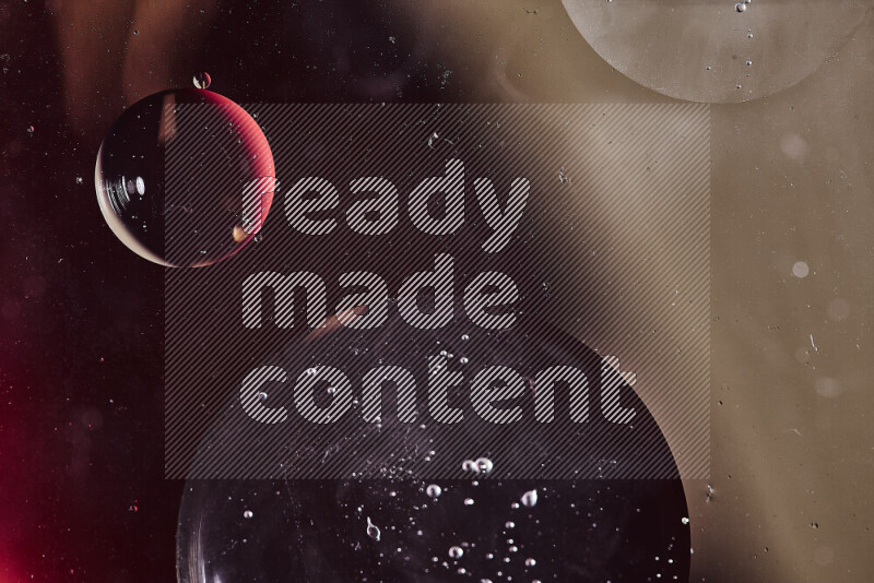 Close-ups of abstract oil bubbles on water surface in shades of red and brown