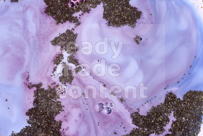 لقطة مقربة لبريق ذهبي متلألئ منتشر على خلفية من اللون الأزرق والأحمر في حركات دائرية