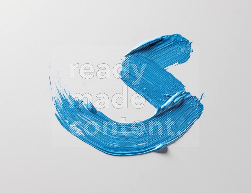 Multi blue curved brush strokes shaped into different shapes on a white background
