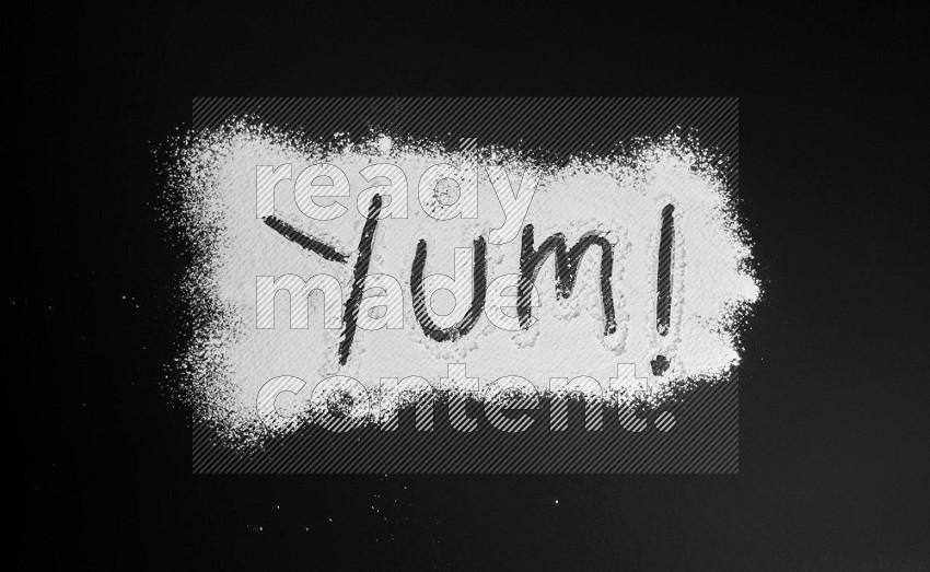 A word written with powder on black background